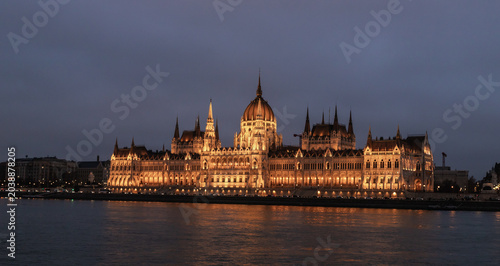 Bild auf Leinwand View from Buda Embankment of Parliament building illuminated by a floodlights on