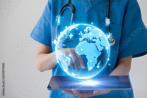 Healthcare professional holding a glowing digital globe on a tablet