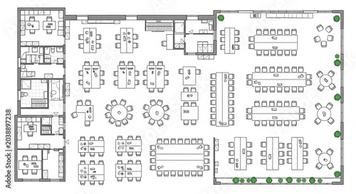 Large office building floor plan with multiple workstations and rooms