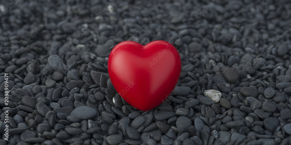 Fototapeta premium Single Glossy Red Heart Object Centered on a Textured Bed of Black Beach Pebbles