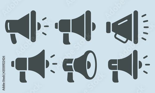 Set of black and white megaphones and loudspeakers icons in line art style isolated on white background