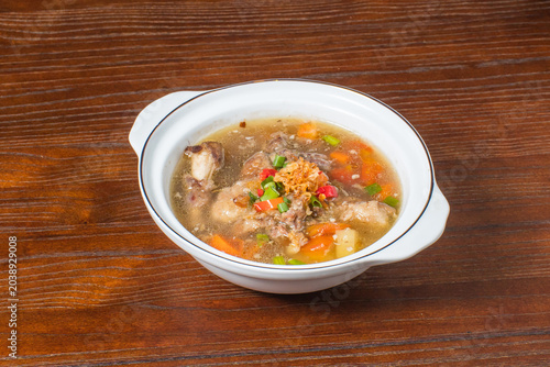 Schilderij op canvas Authentic Indonesian sop buntut oxtail soup with hearty vegetables and aromatic