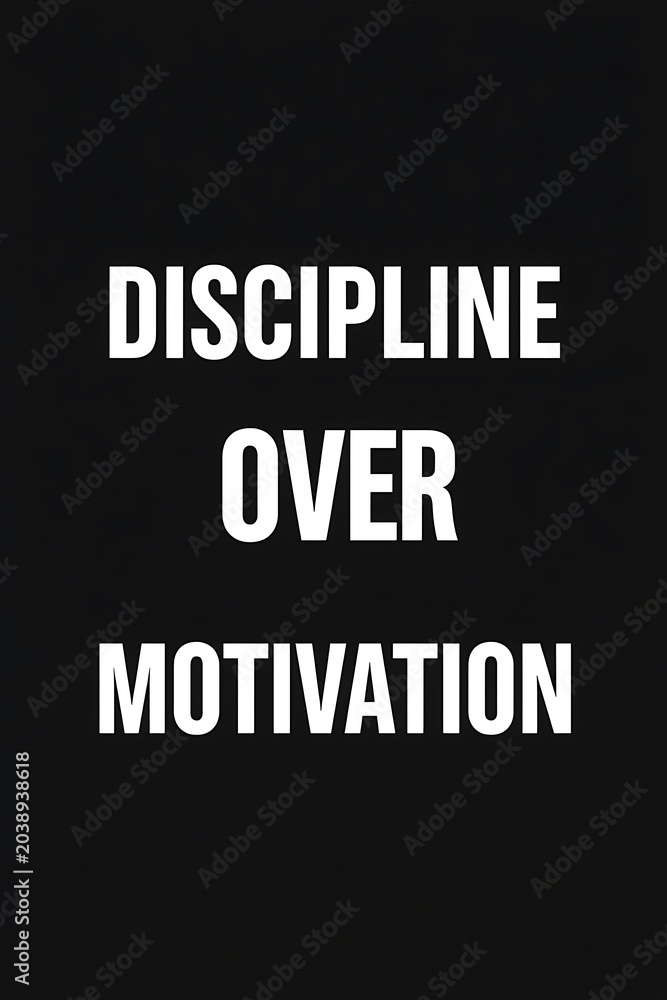 Fototapeta premium A motivational graphic displaying the white text discipline over motivation on a black background