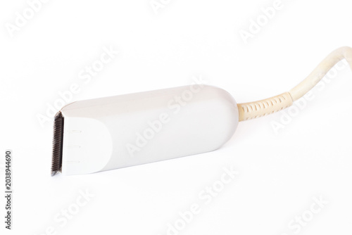 Tableau sur toile Compact electric sideburn trimmer isolated on a white background
