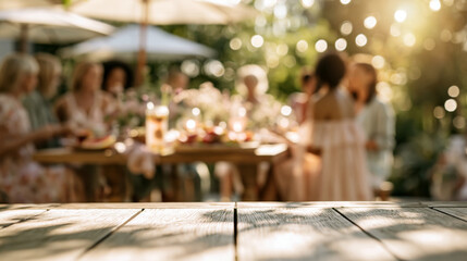 Warm green garden brunch lifestyle scene with women, blurred bokeh dining table and wooden foreground for summer social background use