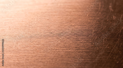 Copper metal texture background with scratches