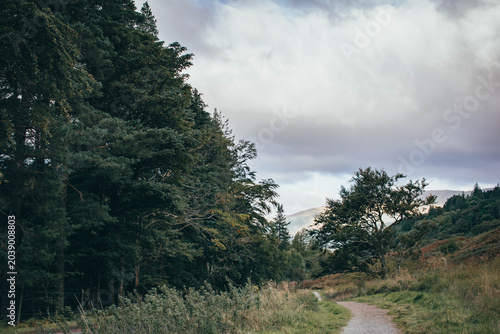 Hiking through the dramatic mountain pass of Glen Coe, Scottish Highlands