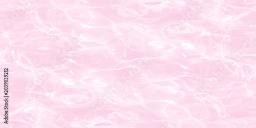 Quadro su tela Pink water surface background with gentle ripples and soft sunlight reflections