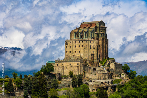 Schilderij op canvas Sacra di San Michele abbey perched on Mount Pirchiriano at the entrance of the S