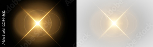 Fotografie golden lens flare effect with bright light and circular glow on black background