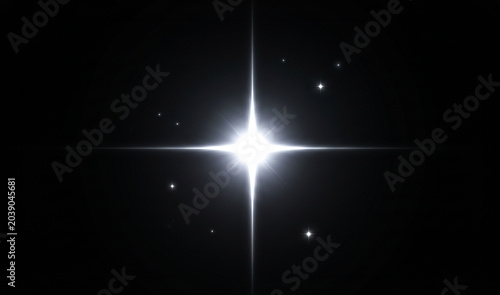 Obraz na plátne bright white star with starburst effect and smaller stars in space background