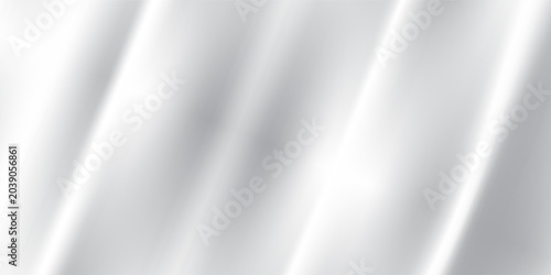 Silver foil background with metal mirror texture. Chrome gradient surface with light gloss simple abstract