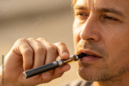 man, electronic cigarette, close-up,