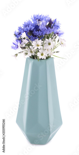 Foto Beautiful wildflowers in vase isolated on white