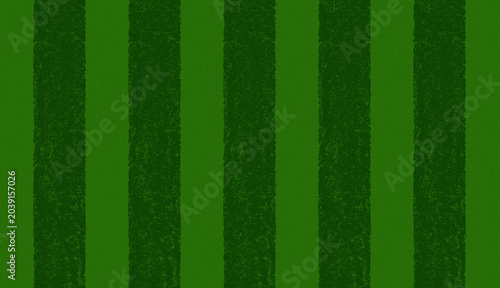 Fotografie Green striped soccer field background with alternating dark and light green stri