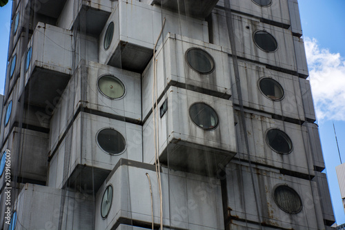 Historical Resource (24 October 2018) of Tokyo, Japan : close up of the capsule pod in Nakagin Capsule Tower (1972-2022 demolition) , It was the world's first example of capsule architecture