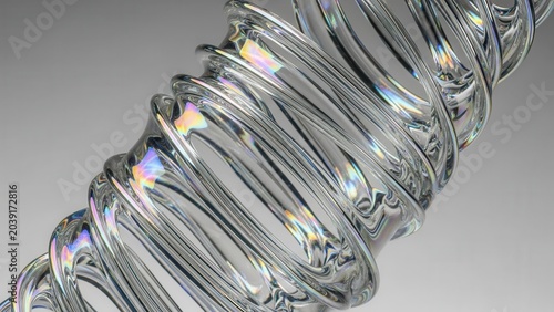 Close-up of a clear, twisted glass sculpture with iridescent light reflections on its intricate helical form.