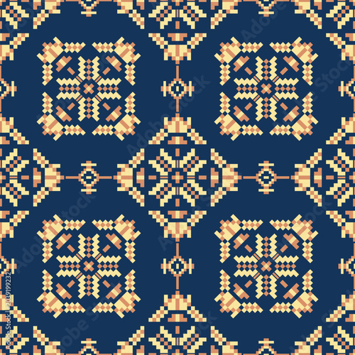 Abstract geometric seamless pattern inspired by traditional folk embroidery and pixel art. Yellow and beige ethnic tribal ornaments tile perfectly on a dark navy blue background, ideal for textiles.