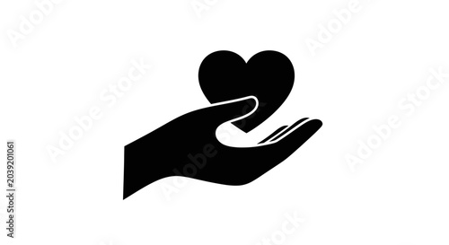 Obraz na płótnie Heart shape held in a hand symbolizes charity, compassion, and the act of giving support or care to those who need kindness and empathy in a professional or personal social environment