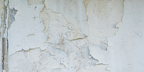 Foto Textura de pared blanca envejecida con pintura descascarada y grietas, fondo abs