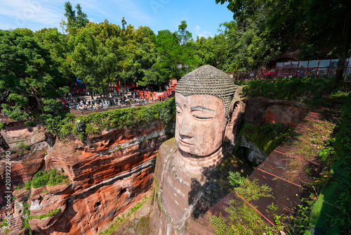 Fotografija The Leshan Giant Buddha, a monumental stone statue carved out of a cliff face in