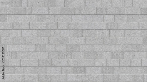 Light gray brick wall texture background with modern stone blocks pattern.