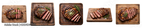 Bild auf Leinwand Grilled Steak Collection: Premium Sliced Beef Steaks with Herbs on Rustic Wooden
