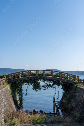 Vertical View of Rustic Arch Bridge at Lake Ikeda Kagoshima