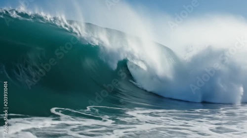 Ocean wave crashing with white foam