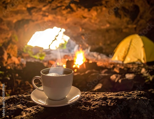Cozy camping scene with hot coffee.