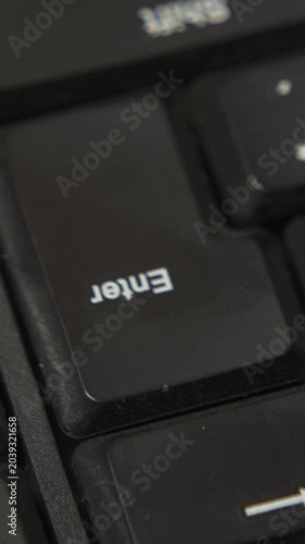 Pressing enter key close up macro shot
