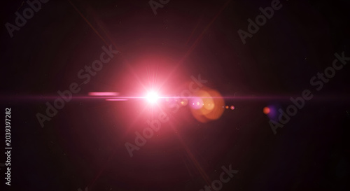 Abstract red and pink lens flare with light streaks and bokeh against a dark background