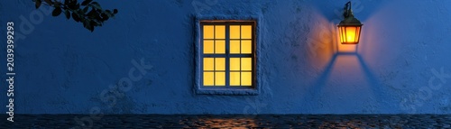 Glowing window and vintage lantern on  weathered blue house wall at night