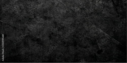 Quadro su tela Dark Stone Texture: A close-up view of a dark, rough stone surface, showcasing its natural texture and earthy tones