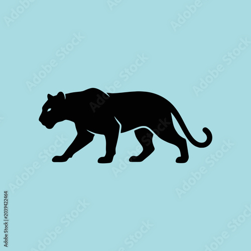 Photography A black silhouette of a wild cat on light blue background