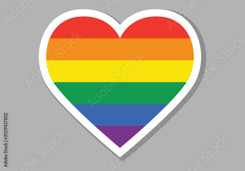 Corazón con los colores de la bandera del orgullo lgbtq y borde blanco sobre un fondo gris