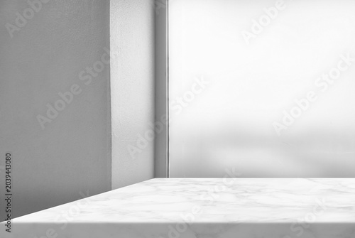 White Marble Table Corner with Stucco Wall and Glass Window Background.