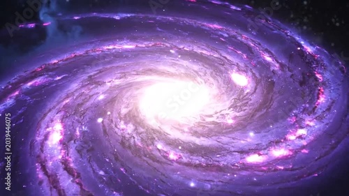 A glowing purple spiral rotates in the deep dark space