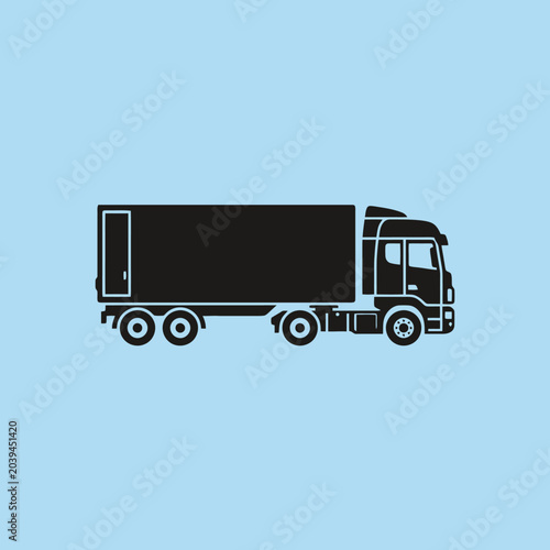 A black silhouette of a heavy freight truck on blue background
