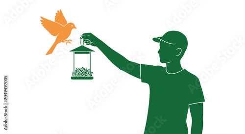 Foto Man holding bird feeder with bird.