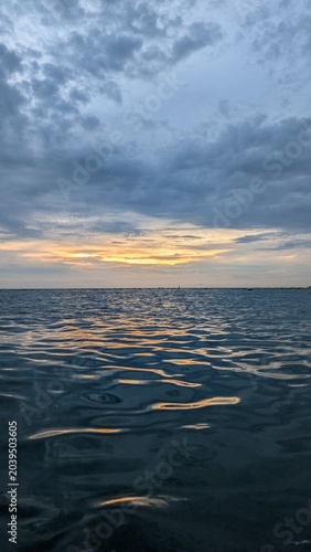 The water surface of the Siamese backwater. The sea at sunset.