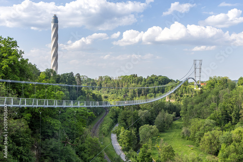 Suspension bridge Neckarline over Neckar river and TK Elevator Test Tower in Rottweil, Germany