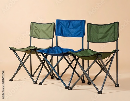 Three outdoor folding chairs in different colors