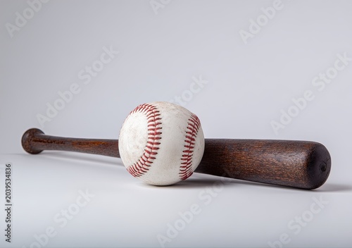 Baseball Bat and Ball on a Plain Background.