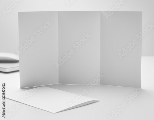 Blank folded paper mockup with minimal white background