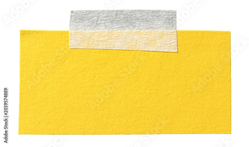 Obraz na plátne Isolated cut out yellow paper note with adhesive sticky tape with copy space for