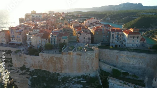4K Aerial Panorama of Beautiful Small Ancient Houses On Rocky Cape On A Sea Coast 
