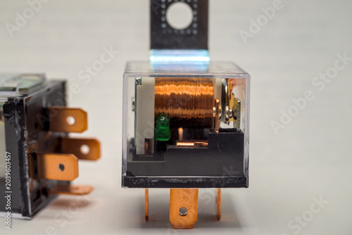 Two relays for four contacts close-up