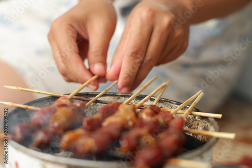 Bild auf Leinwand Mouthwatering grilled chicken gizzard satay with rich traditional spices