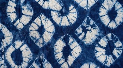 Indigo Shibori Tie Dye Fabric Texture with Circular Patterns.